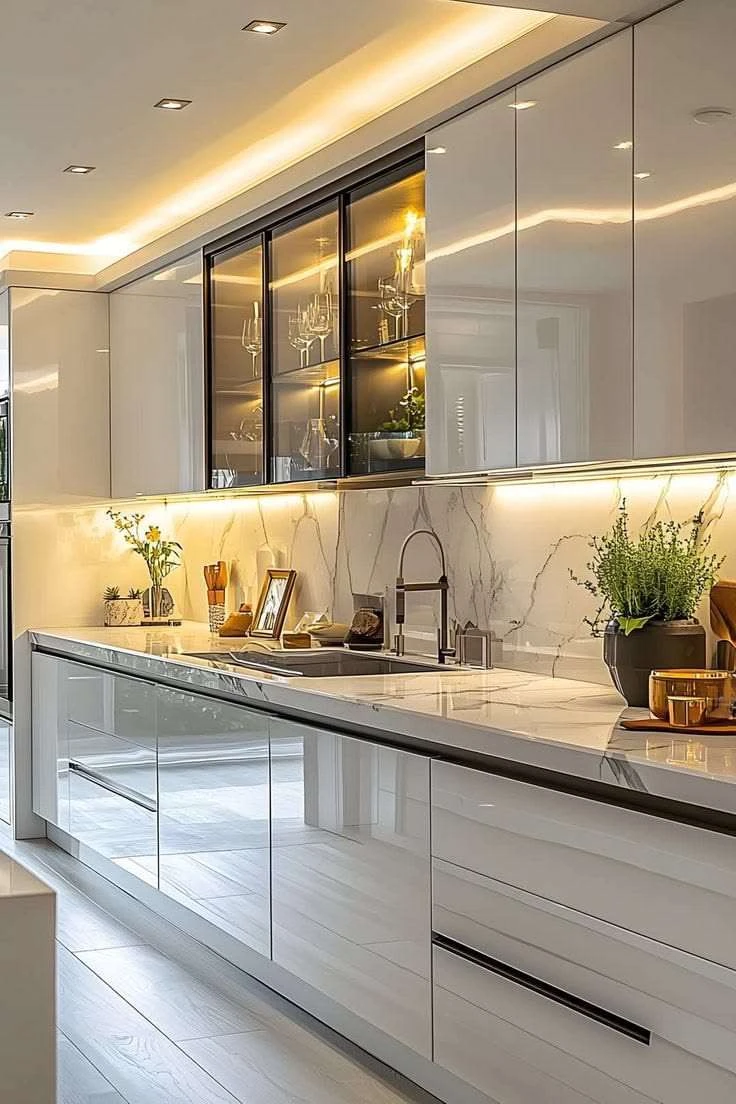 Kitchen cabinetry with glass display doors and light lower drawers